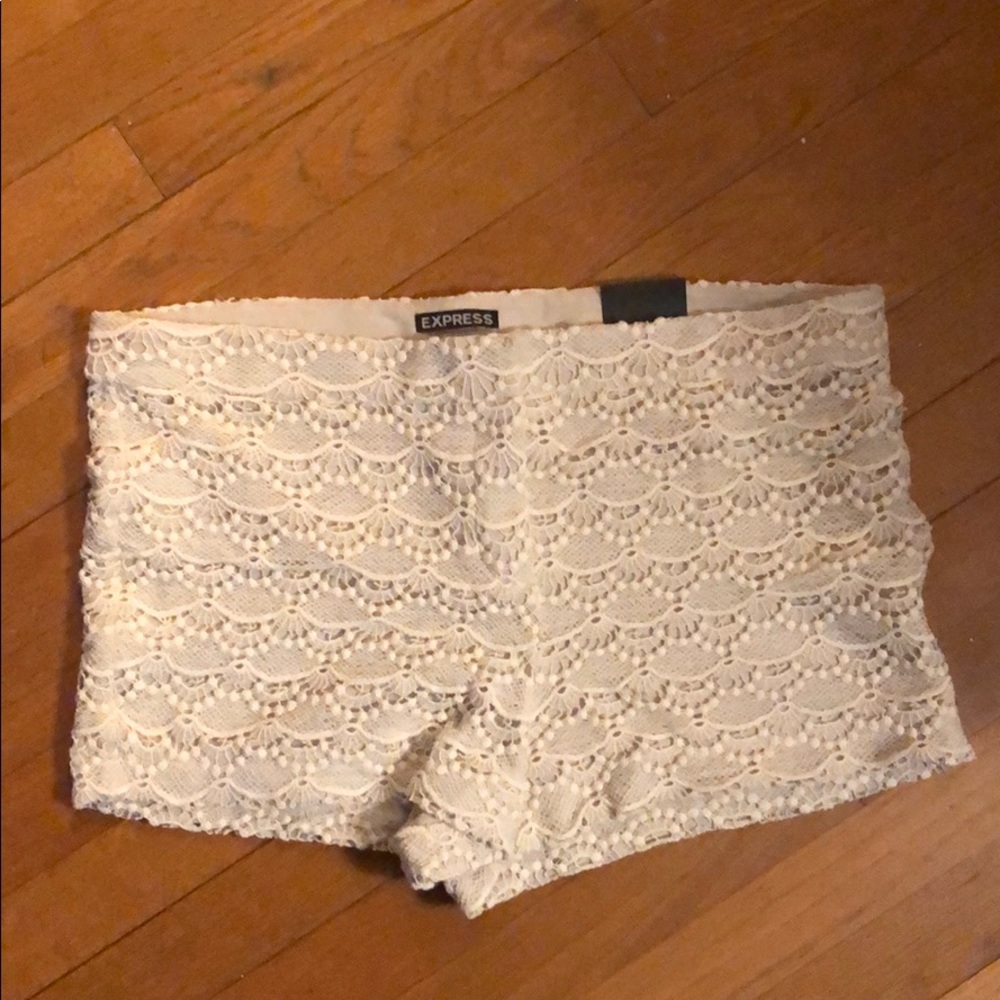 Cream lace shorts from express